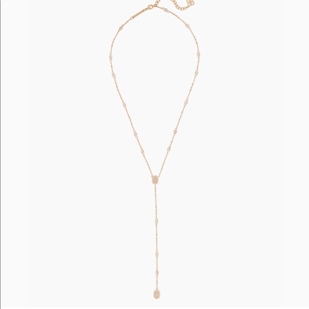 NWT. Kendra Scott Claudia lariat necklace in gold/iridescent drusy. Retail $130.